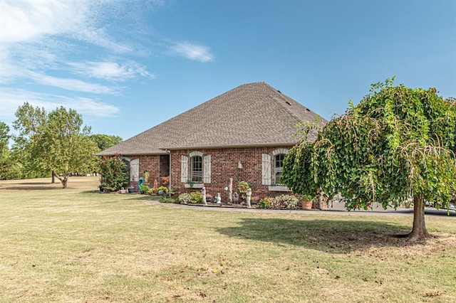 12600 SW 58th St, Mustang, OK 73064 - back of property featuring a yard