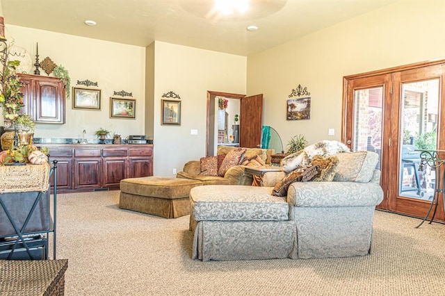 12600 SW 58th St, Mustang, OK 73064 - living room with ceiling fan and light colored carpet