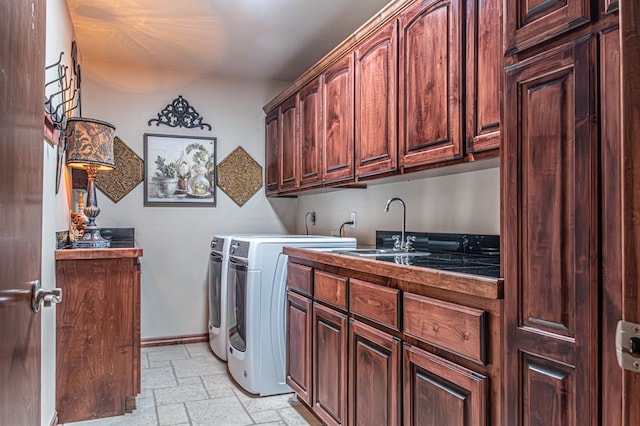 12600 SW 58th St, Mustang, OK 73064 - laundry room with washer and dryer, sink, and cabinets
