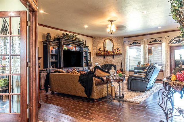 12600 SW 58th St, Mustang, OK 73064 - living room with dark hardwood / wood-style floors, ceiling fan, a stone fireplace, and ornamental molding