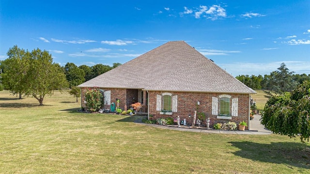 12600 SW 58th St, Mustang, OK 73064 - view of front facade featuring a front yard