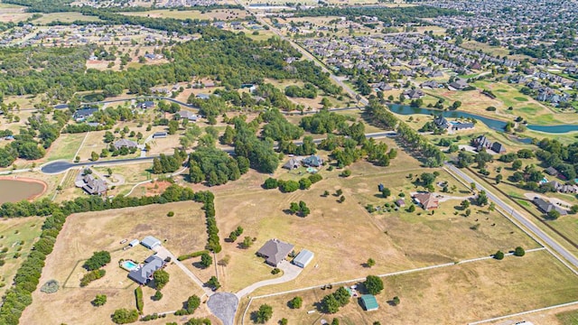 12600 SW 58th St, Mustang, OK 73064 - bird's eye view with a water view