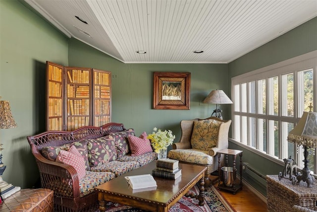 living area featuring wood-type flooring, wooden ceiling, vaulted ceiling, and crown molding