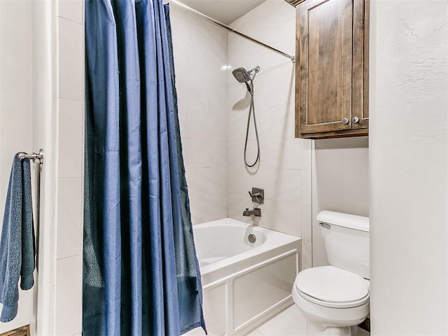 bathroom featuring tile patterned flooring, toilet, and shower / tub combo with curtain