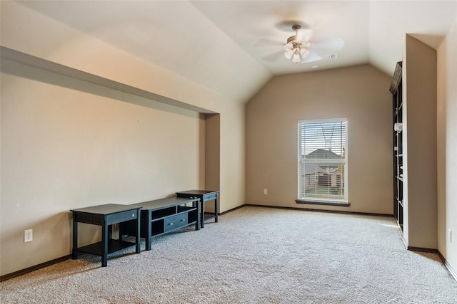 bonus room with ceiling fan, light colored carpet, and lofted ceiling