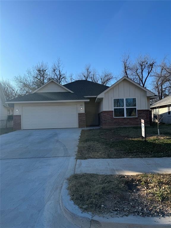 single story home featuring a garage