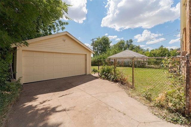 garage with a yard