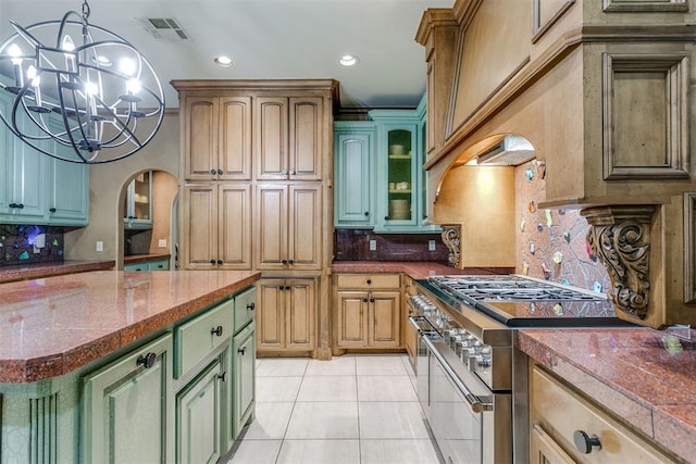 kitchen featuring pendant lighting, an inviting chandelier, green cabinets, high end stainless steel range, and decorative backsplash