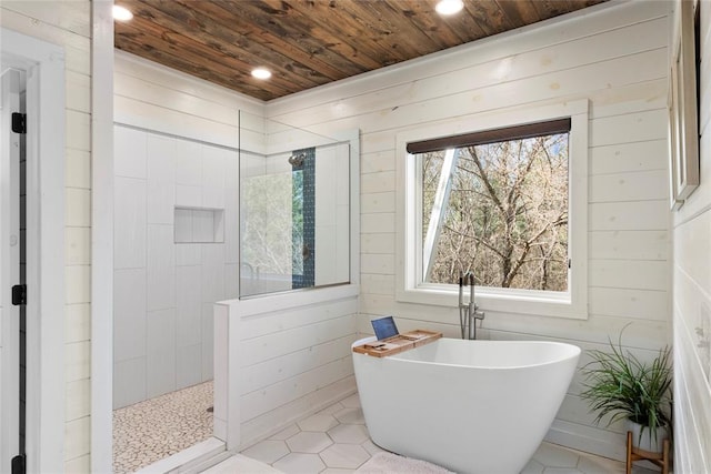 bathroom featuring wooden walls, tile patterned flooring, and wooden ceiling