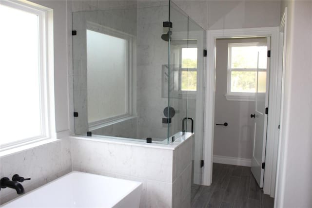 41208 Hazel Dell Rd, Shawnee, OK 74804 - full bathroom featuring a bath and a stall shower