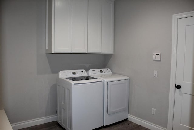 41208 Hazel Dell Rd, Shawnee, OK 74804 - washroom featuring separate washer and dryer, cabinet space, and dark wood finished floors