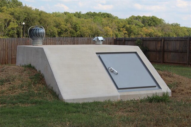 41208 Hazel Dell Rd, Shawnee, OK 74804 - view of storm shelter with a fenced backyard