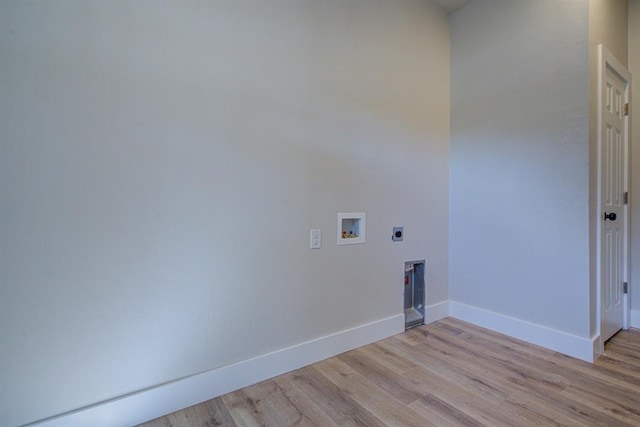 laundry room with washer hookup, electric dryer hookup, and light wood-type flooring