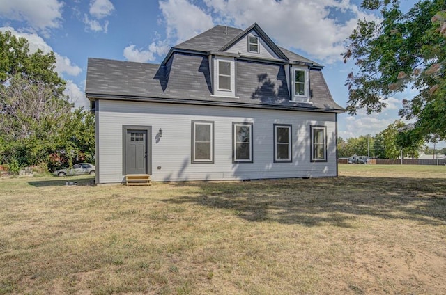 view of front of home with a front lawn