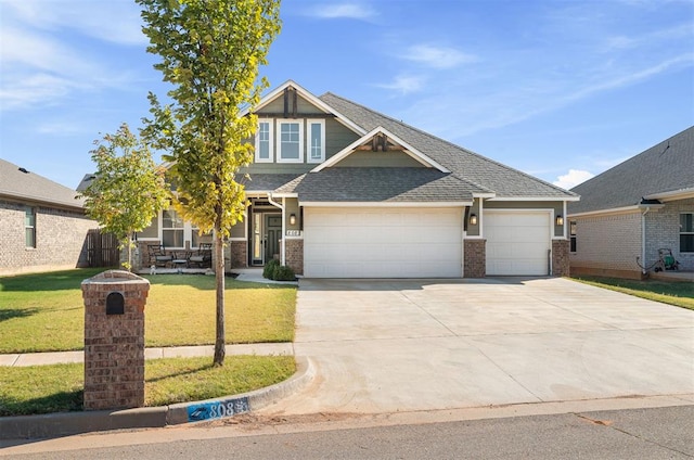 craftsman-style home featuring a front yard