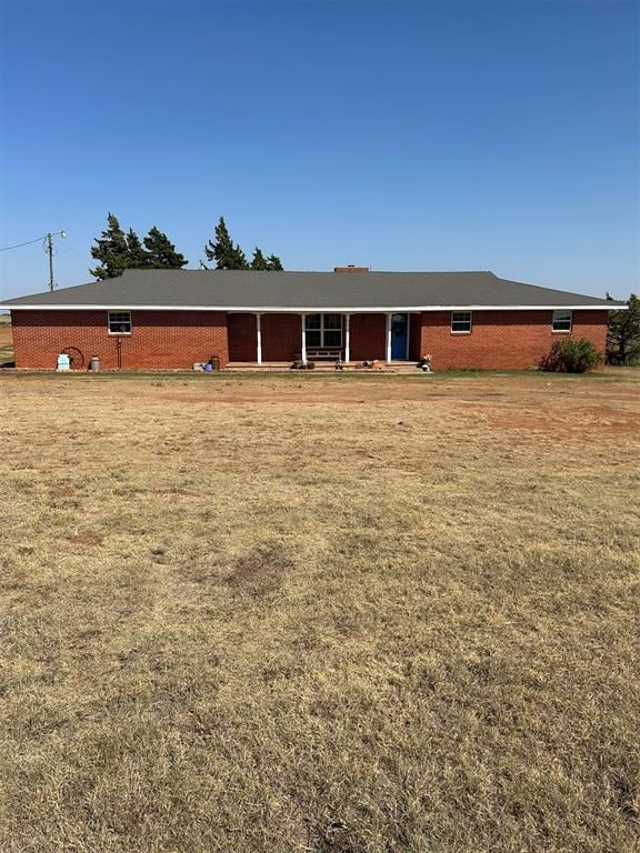 view of front of home with a front yard