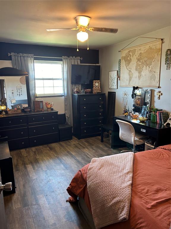 office space with dark hardwood / wood-style flooring and ceiling fan