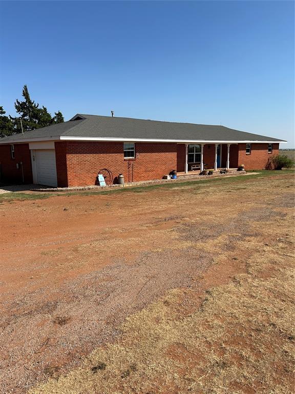 single story home with a garage