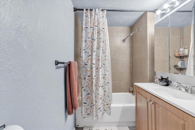 bathroom with shower / bath combo with shower curtain and vanity