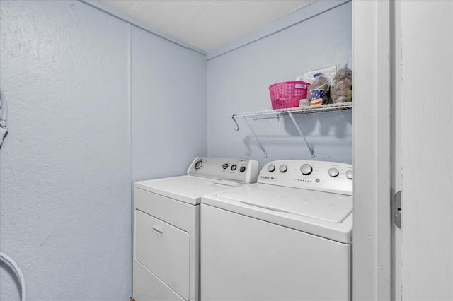 laundry area featuring washing machine and dryer