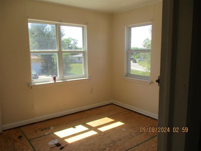 unfurnished room with plenty of natural light