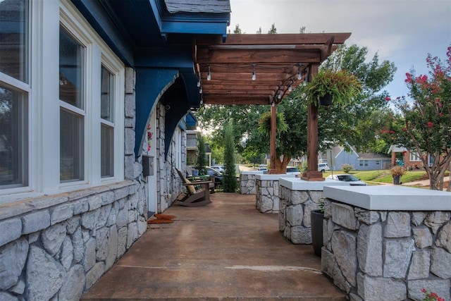 view of patio / terrace featuring a pergola