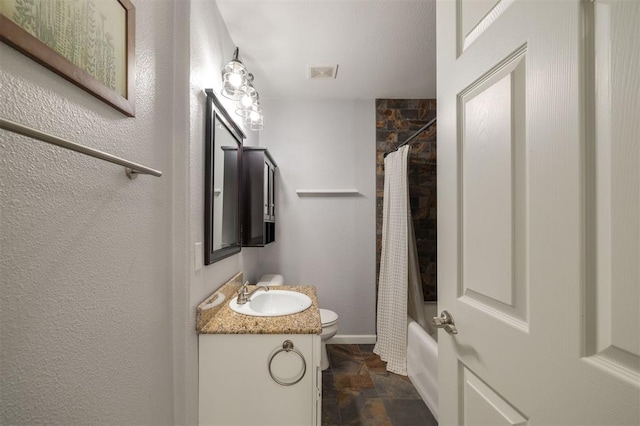 full bathroom with shower / tub combo, vanity, and toilet