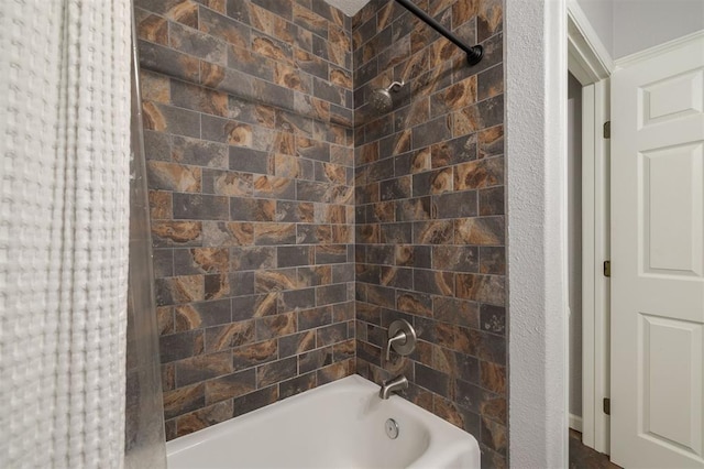 bathroom featuring shower / bathtub combination with curtain