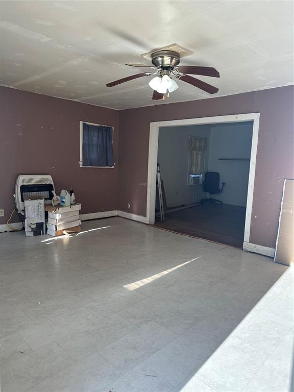 interior space featuring ceiling fan