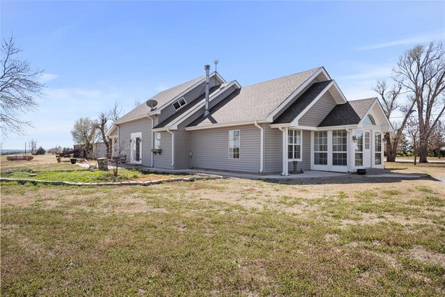 24484 E 990th Rd, Weatherford, OK 73096 - rear view of house with a yard