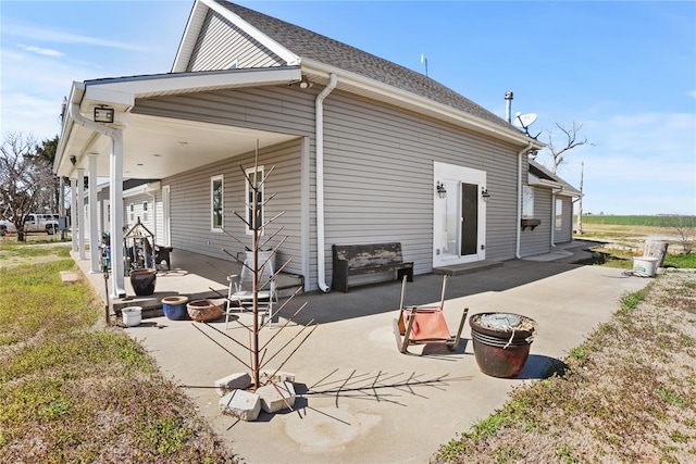 24484 E 990th Rd, Weatherford, OK 73096 - rear view of house with a patio area