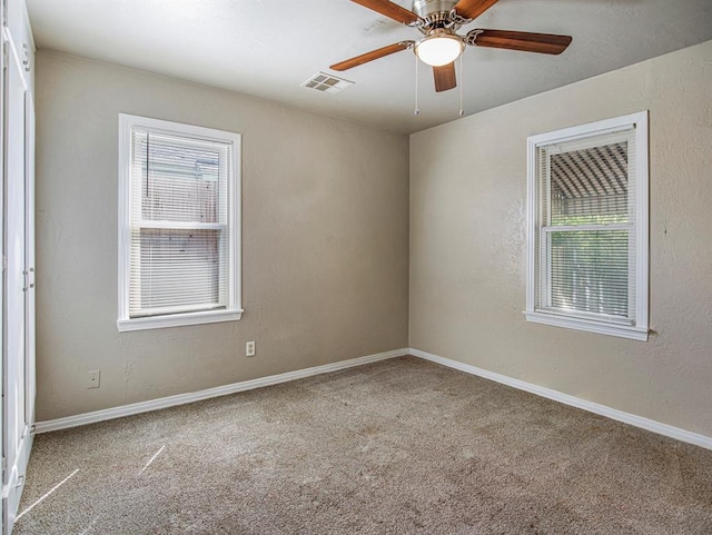 unfurnished room with carpet floors