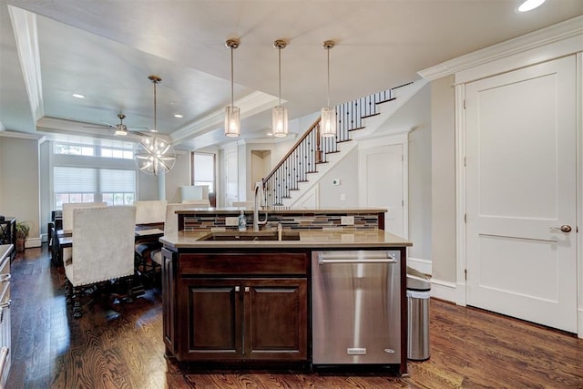 kitchen with sink, dark wood-type flooring, stainless steel dishwasher, an island with sink, and dark brown cabinets