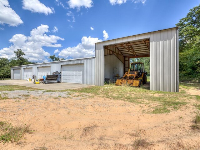 view of outbuilding with a garage