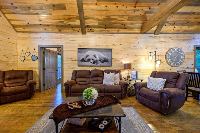 living room featuring lofted ceiling with beams, hardwood / wood-style flooring, and wood walls