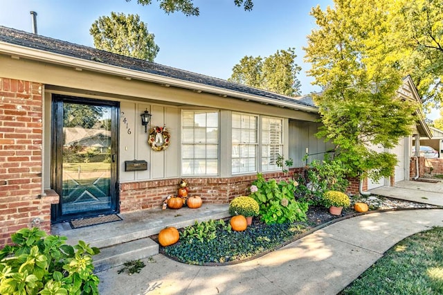 property entrance with a garage