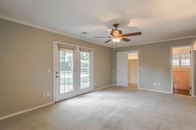 unfurnished room with light carpet, crown molding, and a healthy amount of sunlight