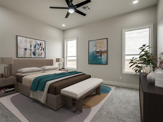 bedroom featuring ceiling fan and carpet