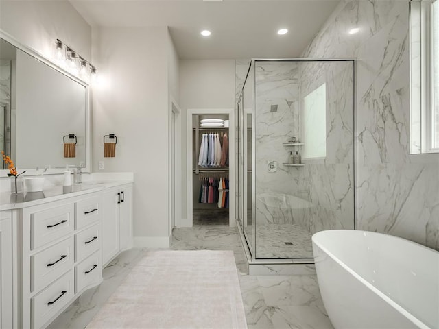 bathroom featuring vanity and separate shower and tub