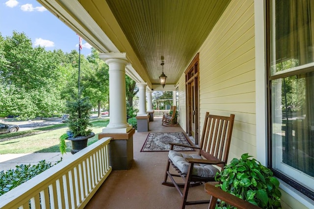 balcony featuring a porch