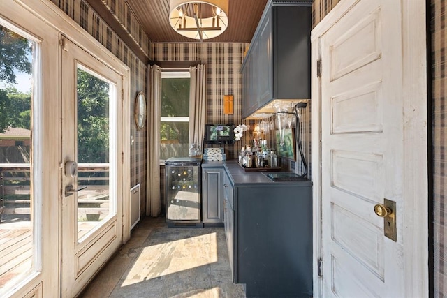 laundry room featuring wine cooler