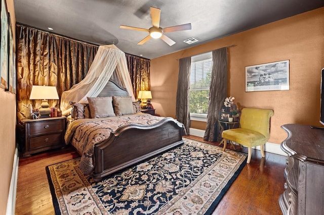 bedroom featuring wood-type flooring and ceiling fan