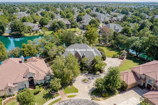 bird's eye view with a water view