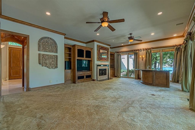 12308 Bywater Rd, Oklahoma City, OK 73170 - unfurnished living room featuring light colored carpet, a fireplace with flush hearth, crown molding, a ceiling fan, and recessed lighting