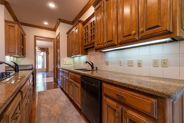 12308 Bywater Rd, Oklahoma City, OK 73170 - kitchen with dishwashing machine, ornamental molding, glass insert cabinets, dark stone counters, and recessed lighting