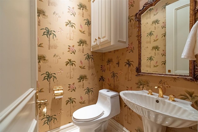 12308 Bywater Rd, Oklahoma City, OK 73170 - bathroom featuring a sink and wallpapered walls