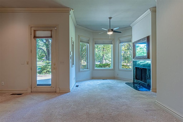 12308 Bywater Rd, Oklahoma City, OK 73170 - unfurnished living room featuring carpet, a fireplace, ornamental molding, and ceiling fan