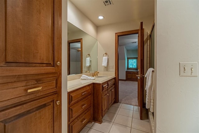 bathroom with vanity and tile patterned floors