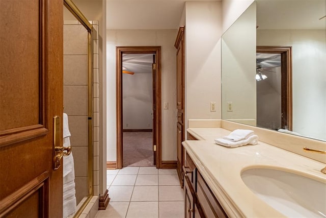 12308 Bywater Rd, Oklahoma City, OK 73170 - bathroom featuring tile patterned flooring, a stall shower, vanity, and a ceiling fan