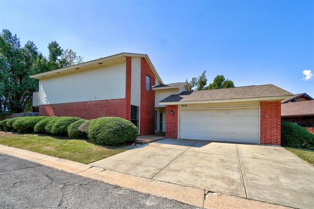 view of front of property with a garage